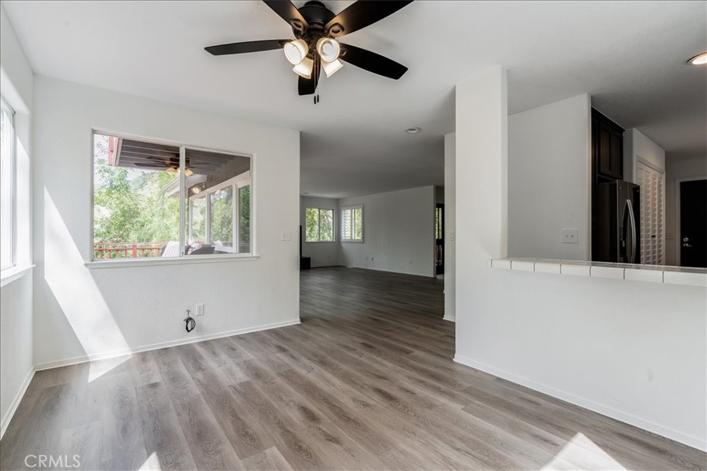 6281 York Mountain Road Templeton, CA 93465 - Photo 7 of 31 wooden floor in an empty room with a window