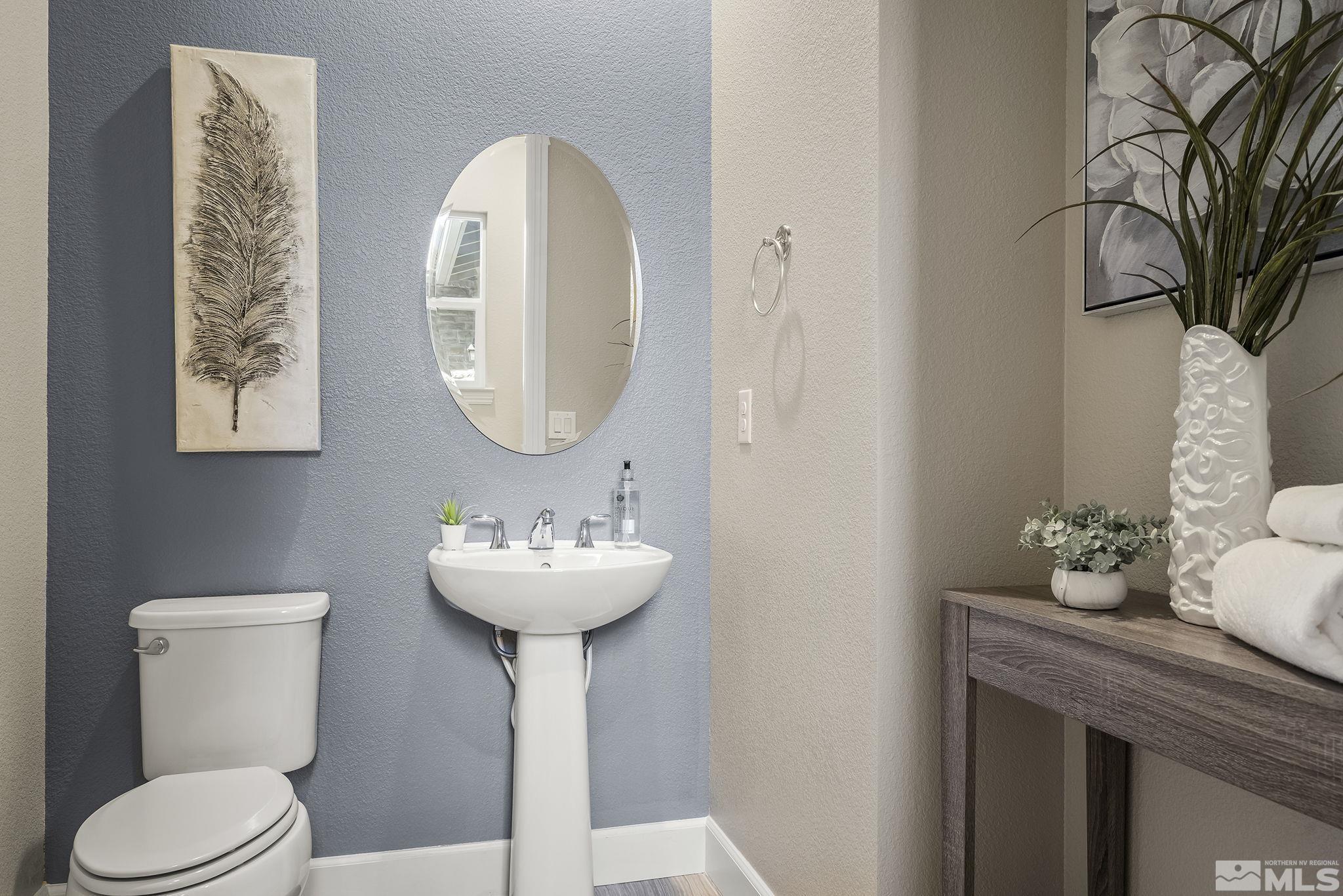 326 Ironway Court Reno, NV 89521 - Photo 27 of 37 a bathroom with a sink and a mirror