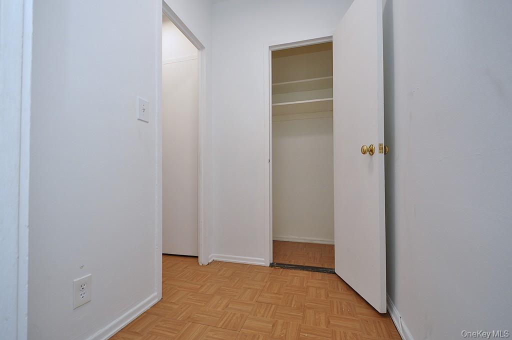 281 Garth Road, Unit B6D Scarsdale, NY 10583 - Photo 17 of 35 Dressing area has a walk-in closet and leads to the bathroom