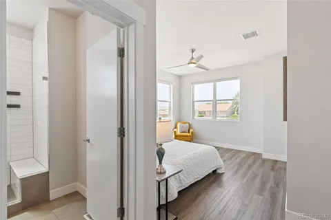 a bed room with a bed and a window