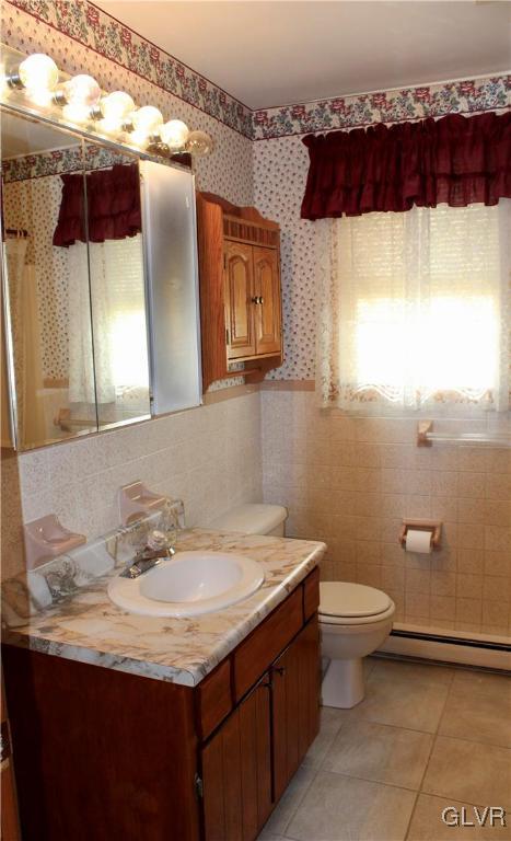 3918 Mechanicsville Road Whitehall, PA 18052 - Photo 13 of 25 a bathroom with a sink and a mirror