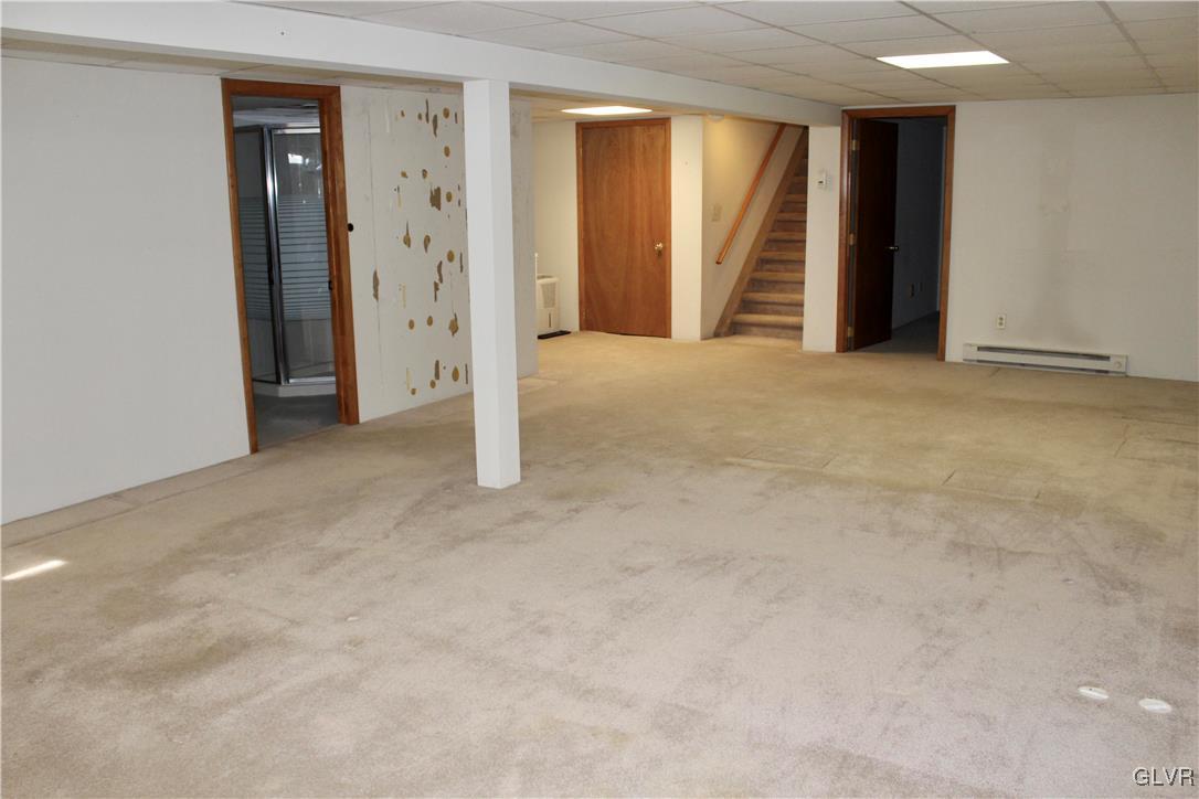 3918 Mechanicsville Road Whitehall, PA 18052 - Photo 19 of 25 a view of an empty room with a fireplace