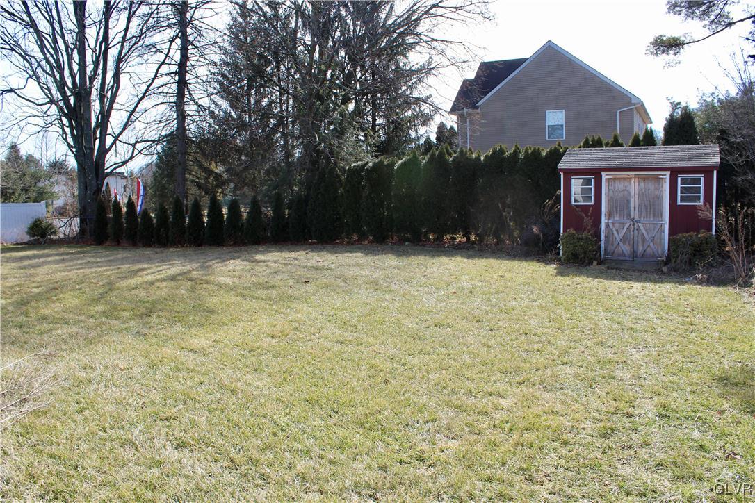 3918 Mechanicsville Road Whitehall, PA 18052 - Photo 24 of 25 a view of a house with a yard