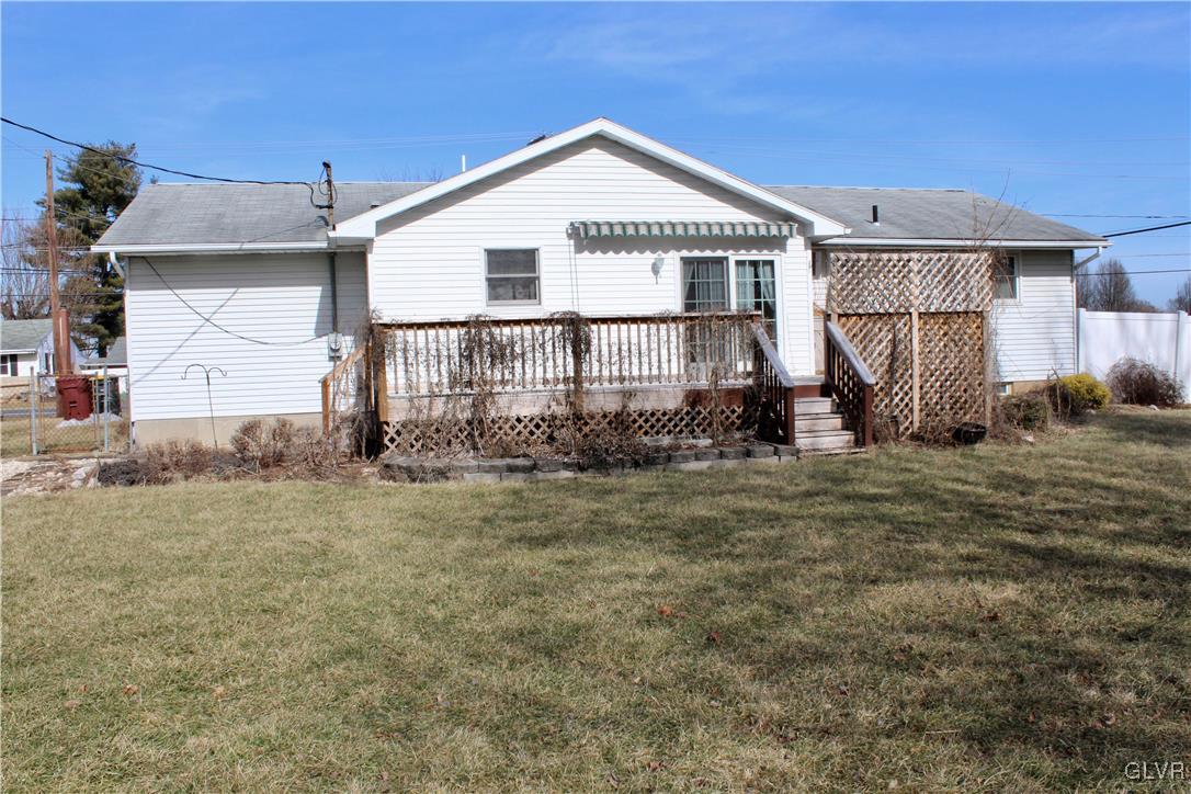 3918 Mechanicsville Road Whitehall, PA 18052 - Photo 25 of 25 a front view of a house with a garden