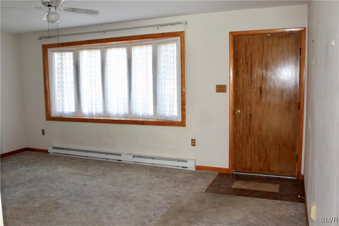3918 Mechanicsville Road Whitehall, PA 18052 - Photo 3 of 25 an empty room with windows