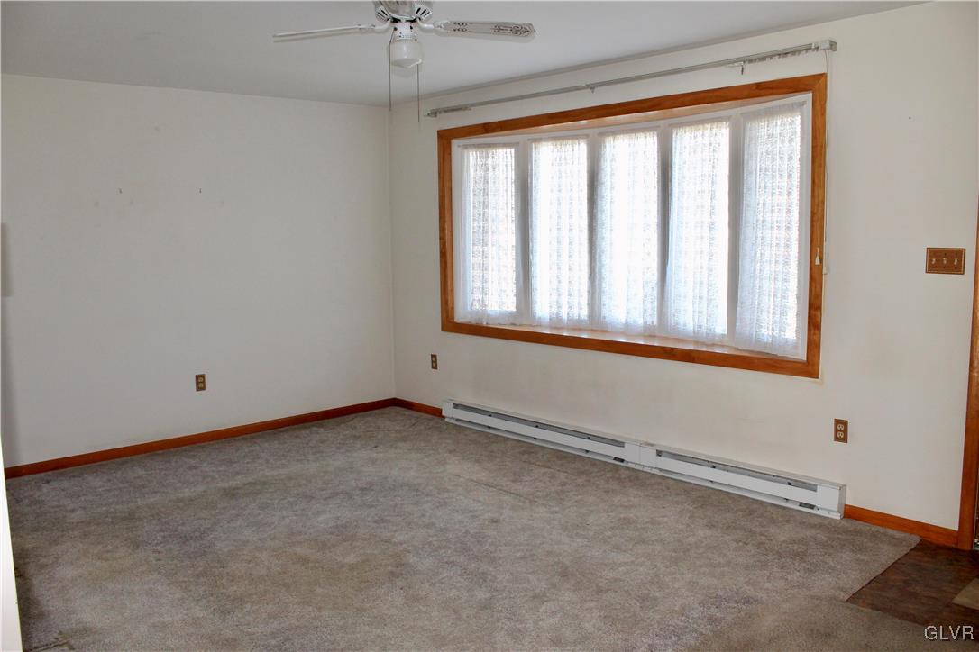 3918 Mechanicsville Road Whitehall, PA 18052 - Photo 4 of 25 an empty room with a window