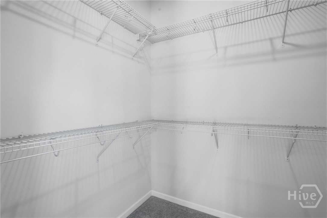 145 Binscombe Lane Pooler, GA 31322 - Photo 31 of 51 Primary walk-in closet