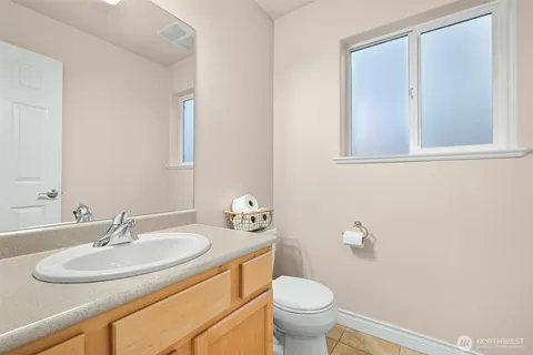 a bathroom with a sink and a toilet