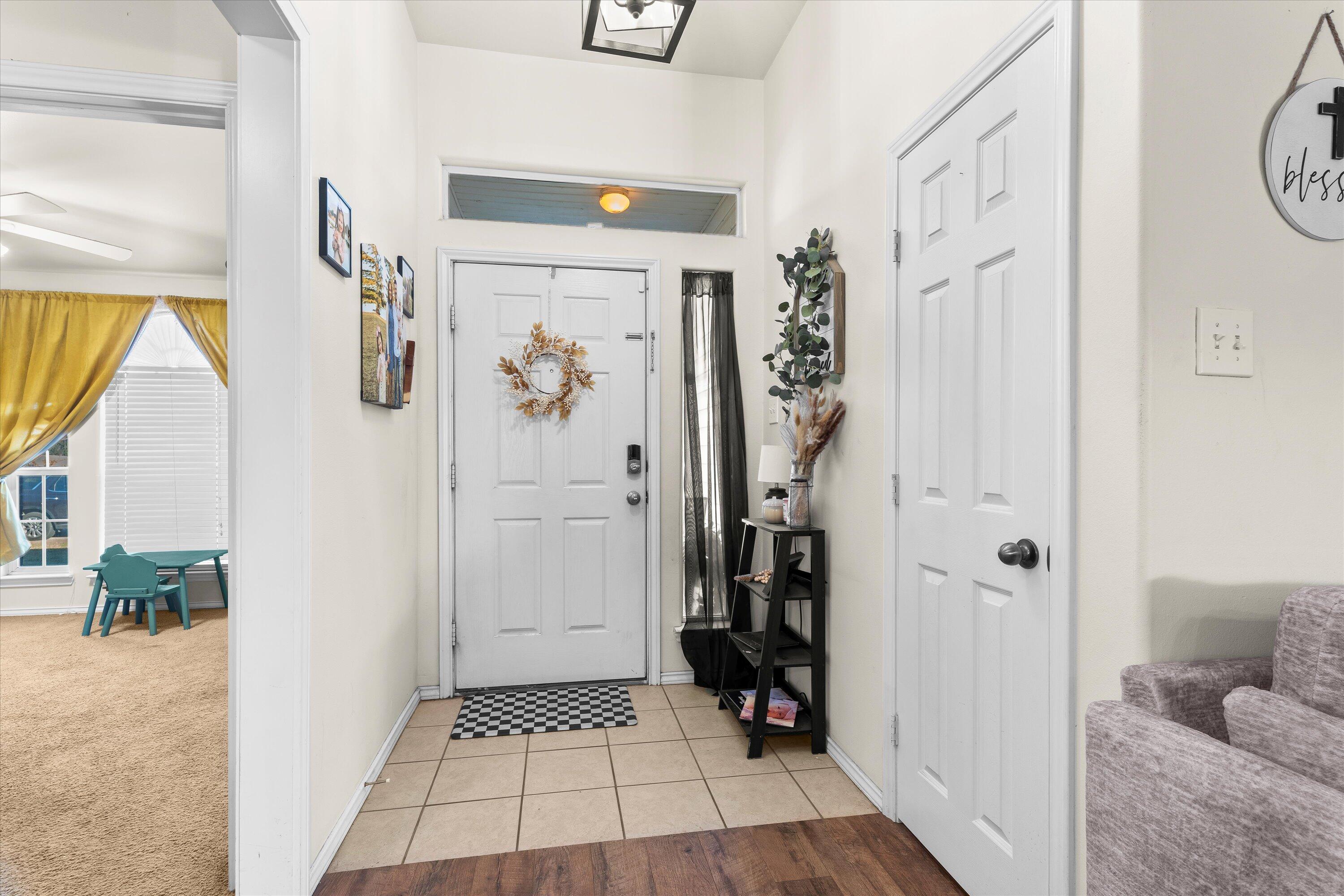 6513 85th Street Lubbock, TX 79424 - Photo 4 of 22 a view of walk in closet with clothes and shoes