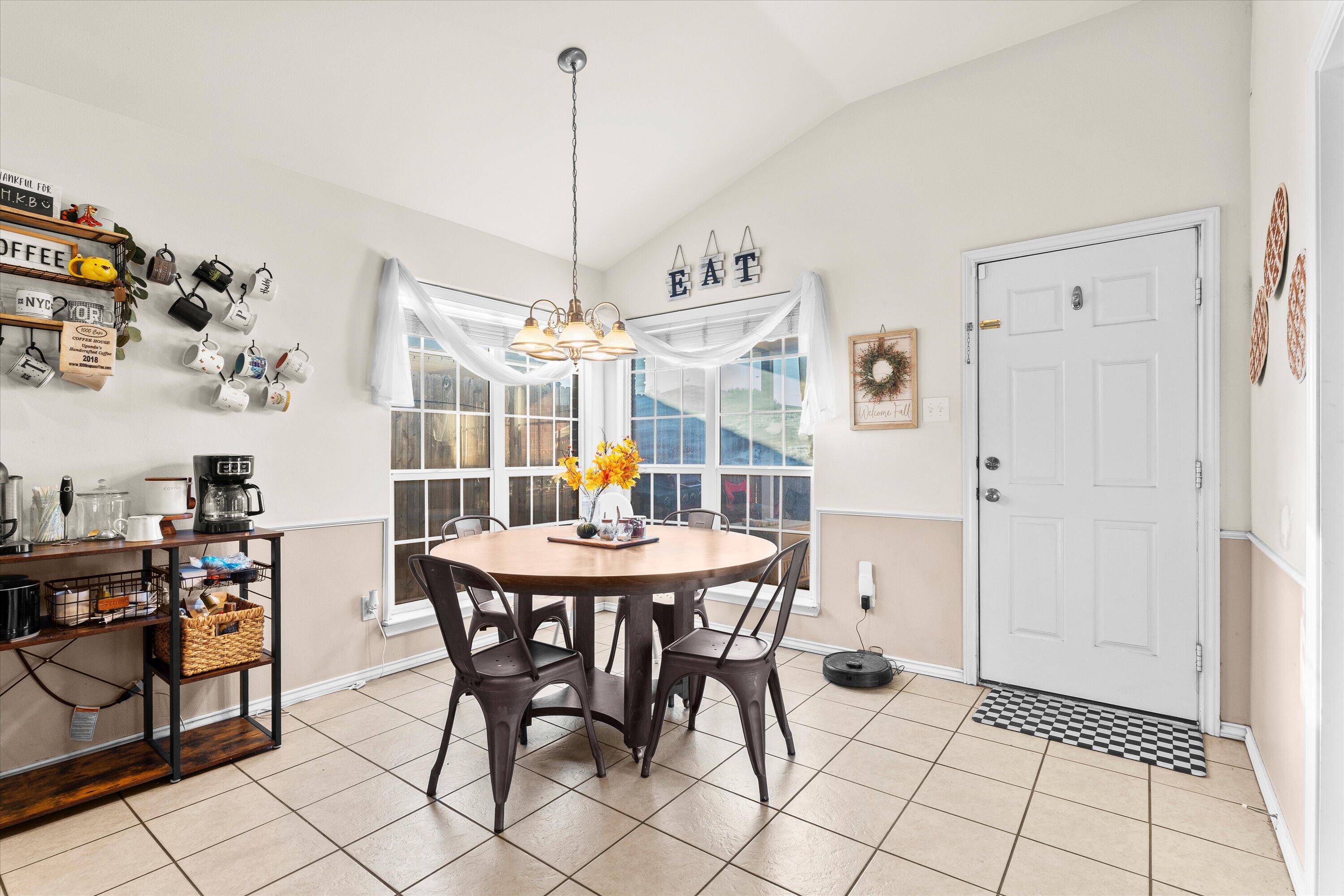 6513 85th Street Lubbock, TX 79424 - Photo 8 of 22 a view of a dining room with furniture