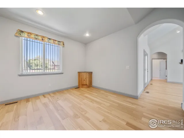 a view of an empty room and window