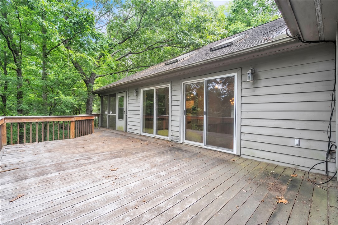149 Inlet Pointe Drive Anderson, SC 29625 - Photo 32 of 43 Wooded views from a spacious deck provide a serene outdoor living space.