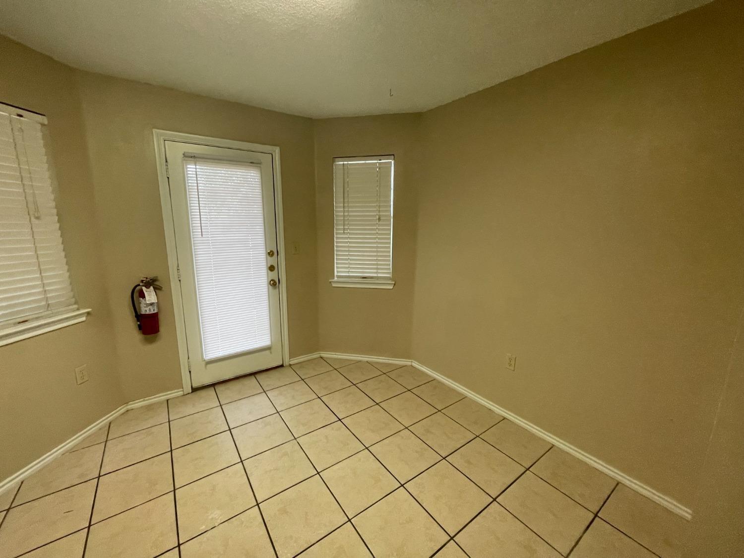 5827 6th Street Lubbock, TX 79416 - Photo 8 of 14 Eating Area-Door to Balcony