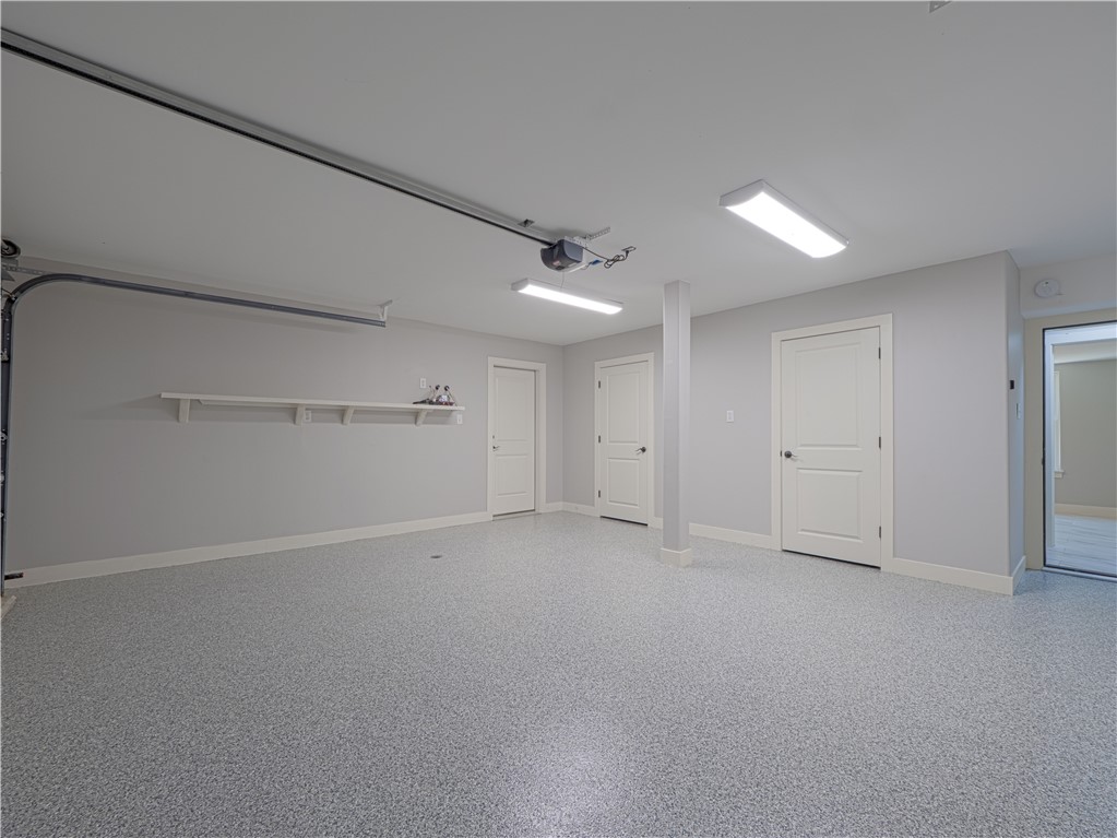 160 Butler Lake Drive St. Simons Island, GA 31522 - Photo 28 of 34 Two Car Garage/ Shark Coating