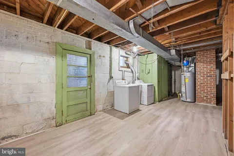 a view of a room with wooden walls