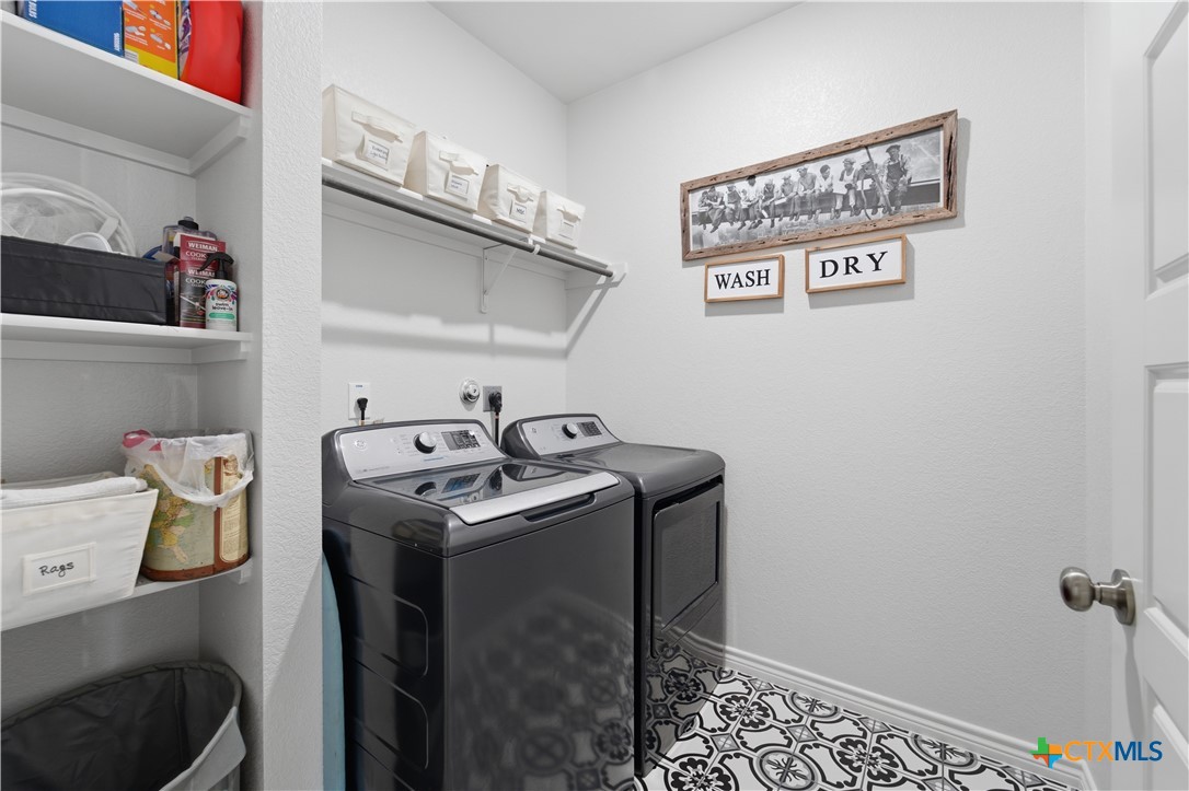6003 Tivoli Road Temple, TX 76502 - Photo 25 of 30 a utility room with dryer and washer