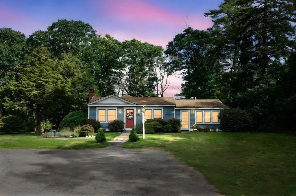 231 Main Street Kingston, MA 02364 - Photo 11 of 25 a front view of a house with a yard and green space