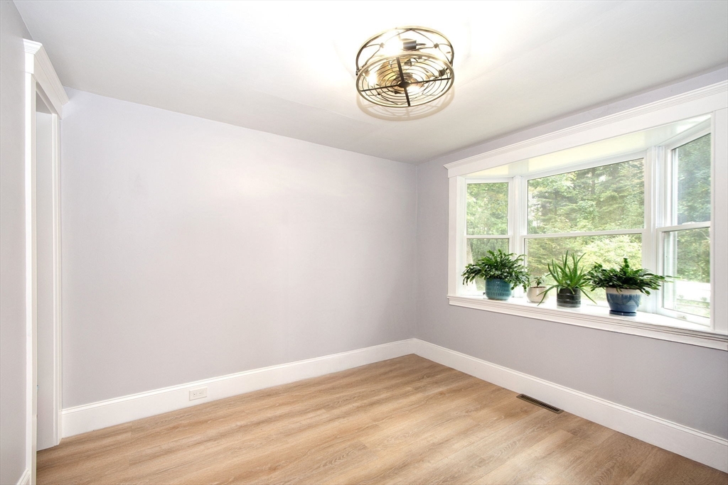 231 Main Street Kingston, MA 02364 - Photo 12 of 25 an empty room with a window