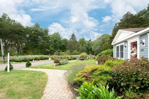 a view of backyard with green space