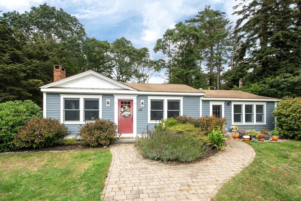 231 Main Street Kingston, MA 02364 - Photo 23 of 25 a front view of a house with a yard