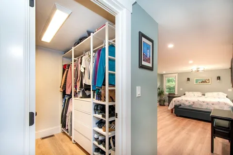 a bedroom with furniture and white walls