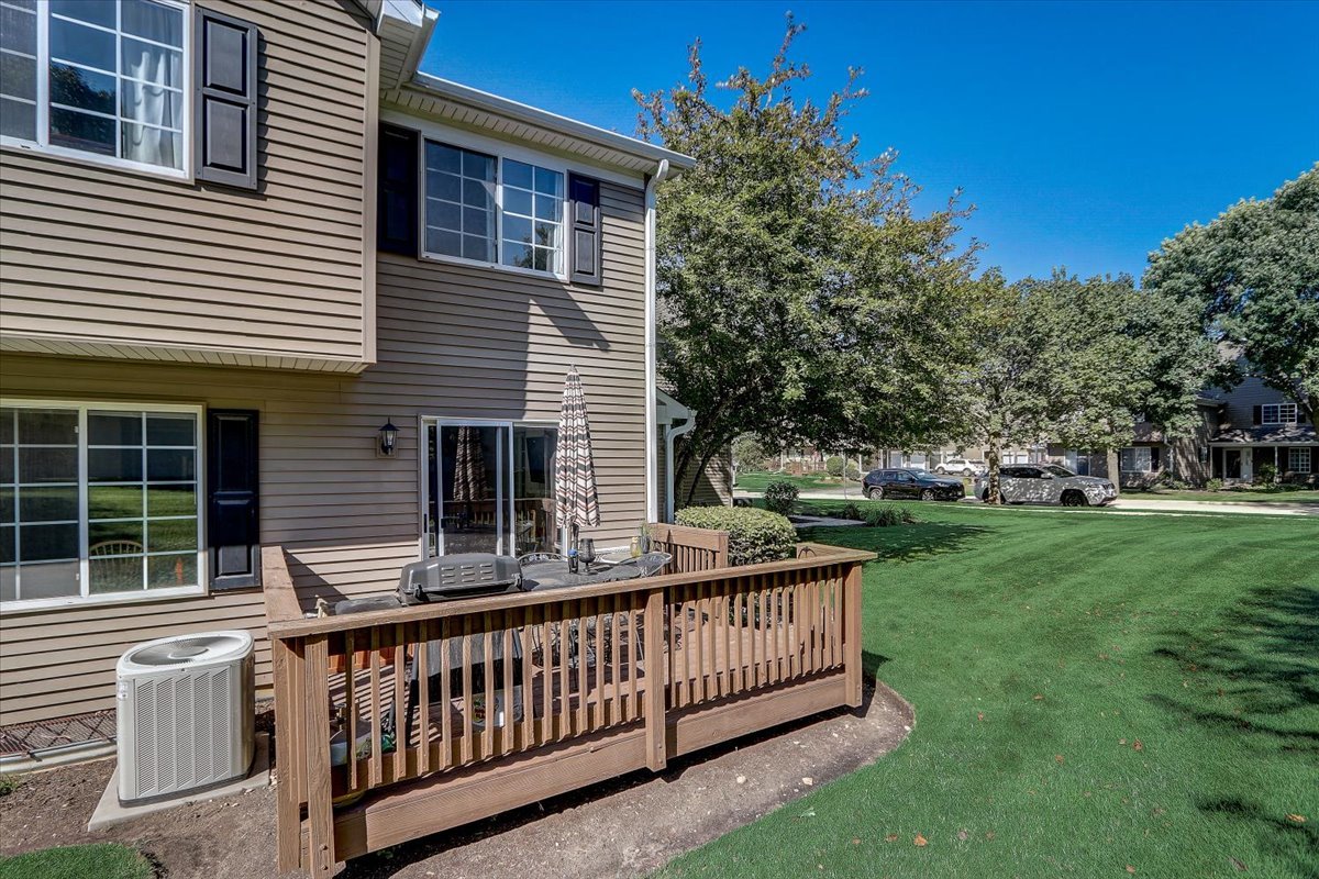 323 Village Creek Drive Lake In The Hills, IL 60156 - Photo 21 of 28 a view of a house with backyard and deck