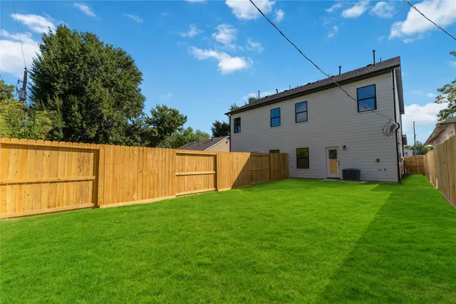 a view of backyard with cabin