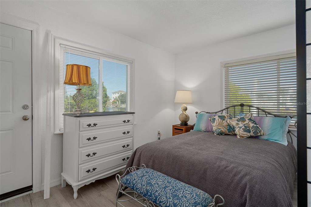 3320 Gardenia Drive Hernando Beach, FL 34607 - Photo 29 of 59 a bedroom with a bed and a window