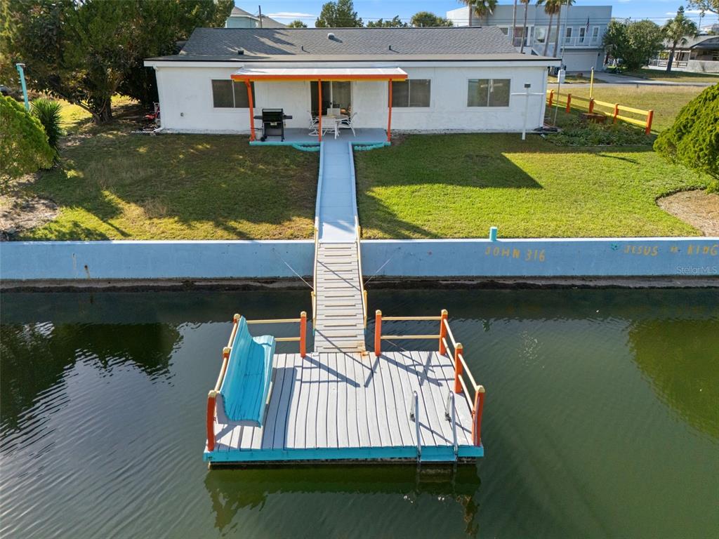 3320 Gardenia Drive Hernando Beach, FL 34607 - Photo 47 of 59 a view of house with swimming pool and yard