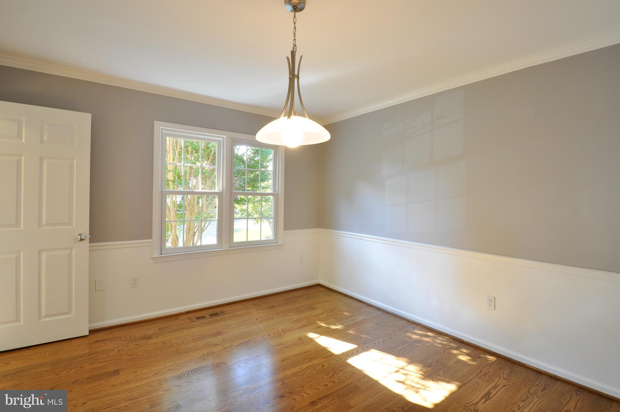 10152 Marshall Pond Road Burke, VA 22015 - Photo 9 of 30 Dining Room with Chair and Crown Molding