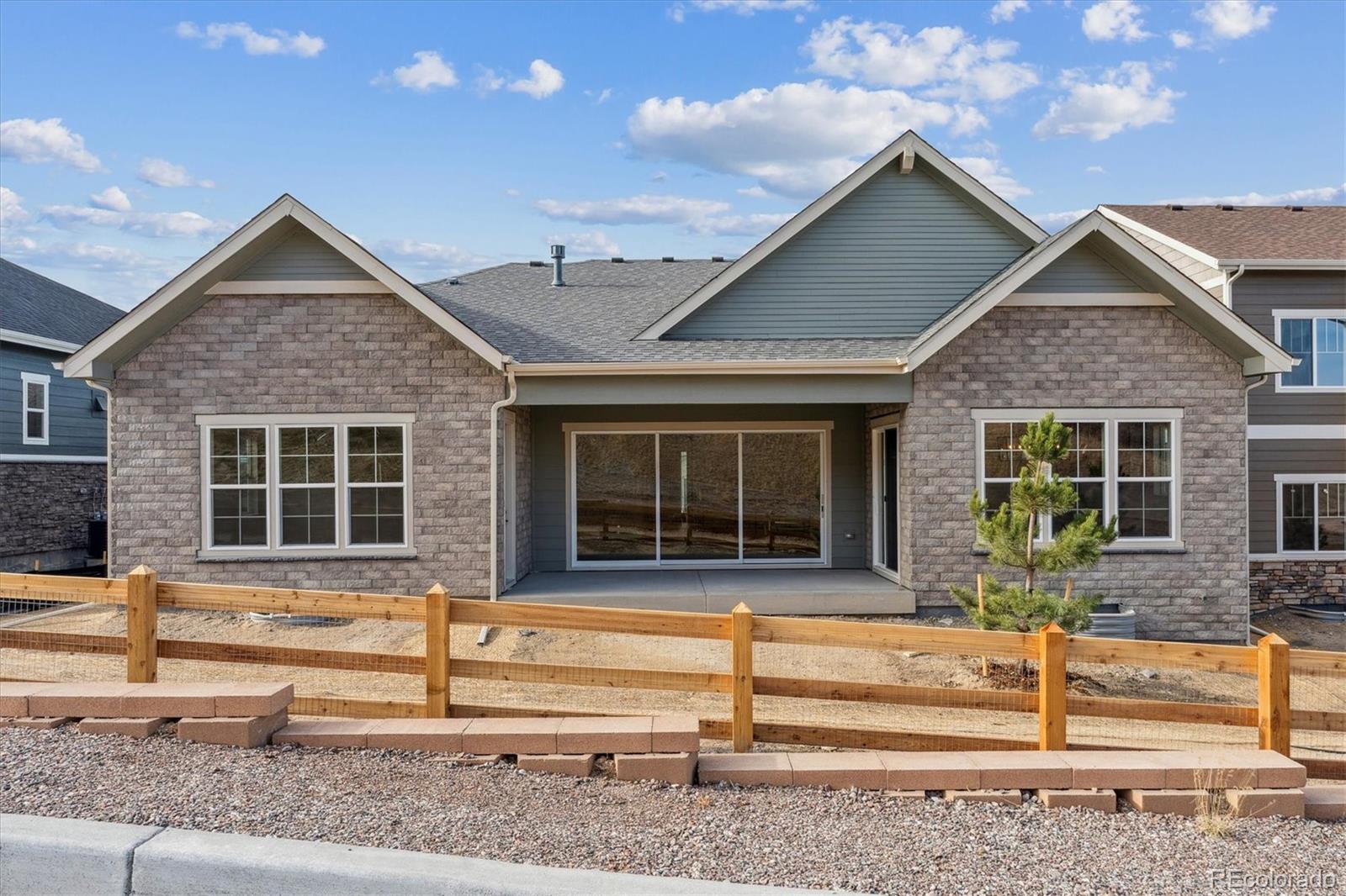 1288 Oleander Street Castle Rock, CO 80109 - Photo 25 of 29 front view of a house with a porch