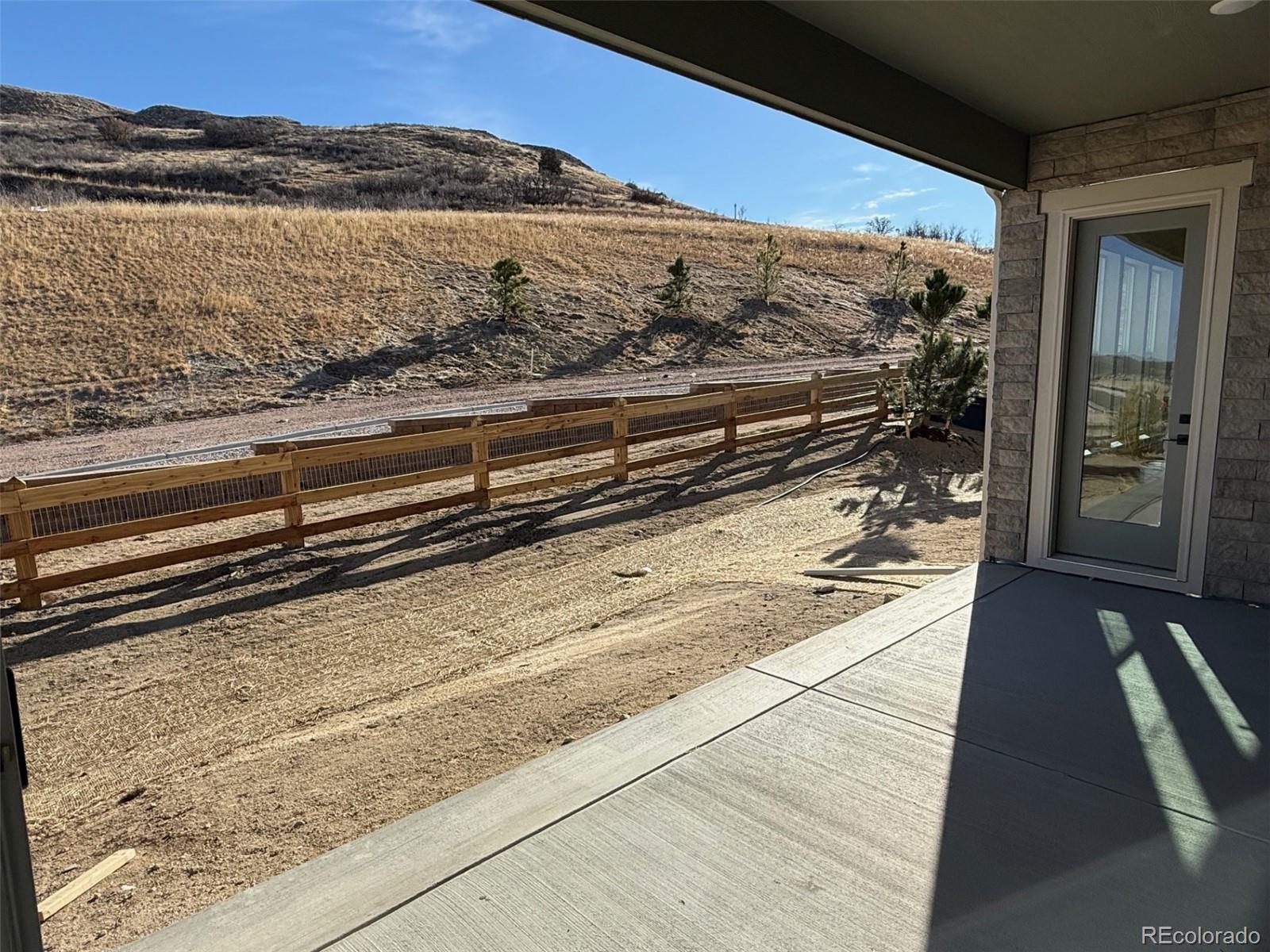 1288 Oleander Street Castle Rock, CO 80109 - Photo 26 of 29 a view of a balcony with an outdoor space