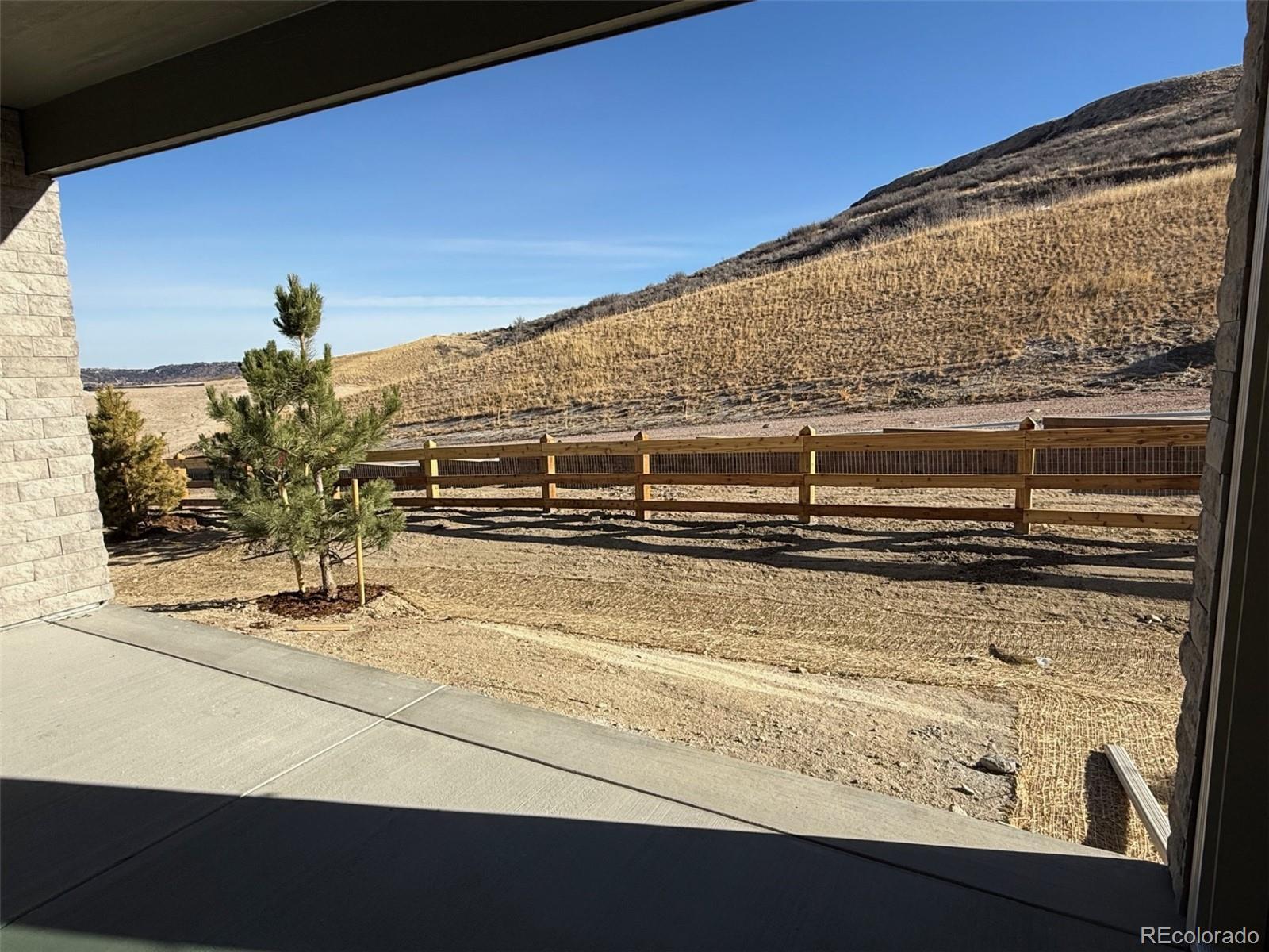 1288 Oleander Street Castle Rock, CO 80109 - Photo 27 of 29 a view of swimming pool with an outdoor space