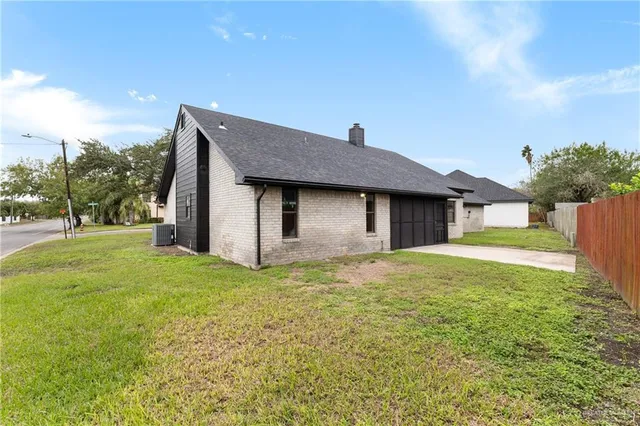 a house view with a garden space