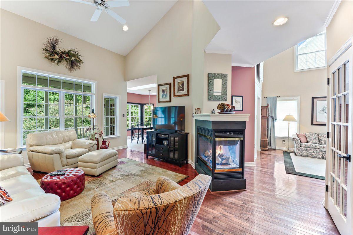 2 Brentwood Road Boothwyn, PA 19061 - Photo 11 of 60 Family room with double-sided fireplace