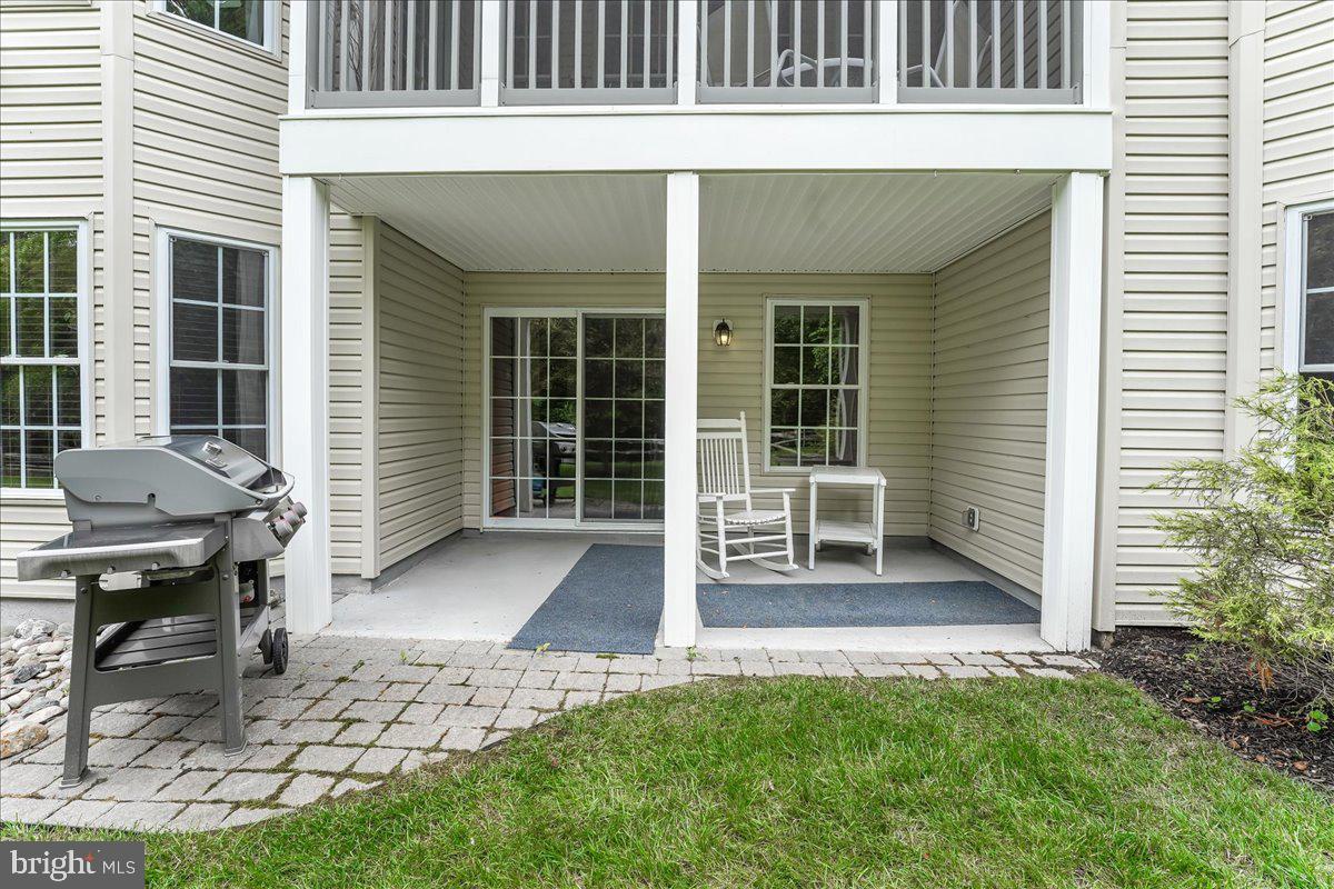 2 Brentwood Road Boothwyn, PA 19061 - Photo 44 of 60 Upper screened in deck and lower walk out patio