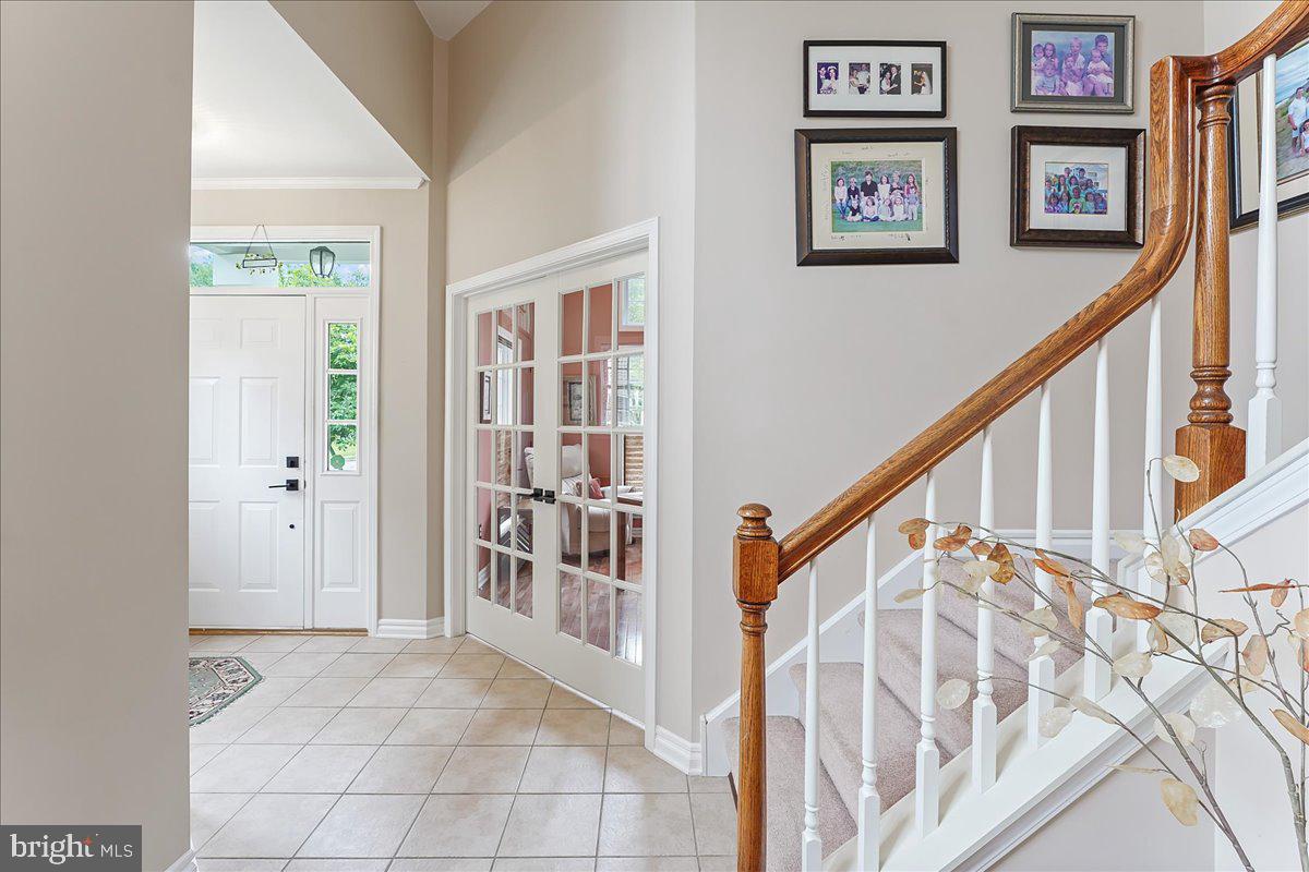 2 Brentwood Road Boothwyn, PA 19061 - Photo 5 of 60 Foyer, doors to office and stairs to second floor