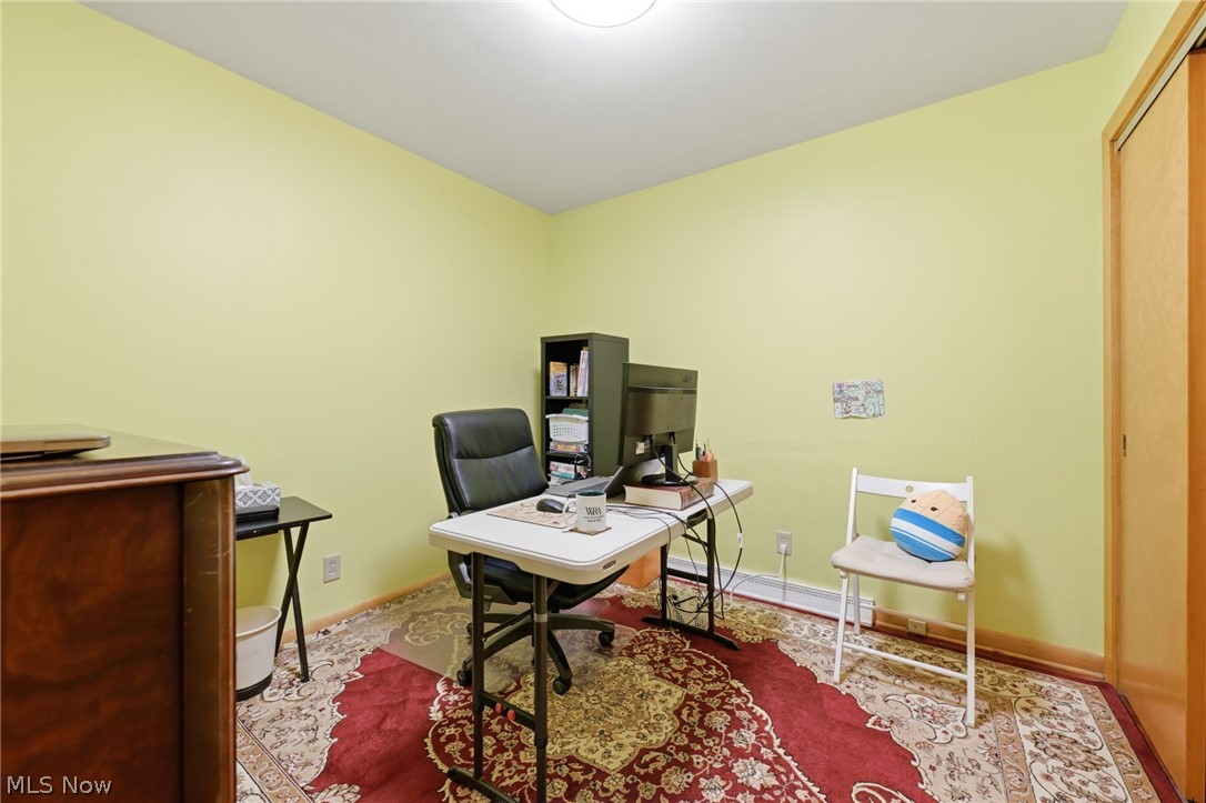 1499 Morris Road Kent, OH 44240 - Photo 14 of 41 Interior room featuring light yellow walls and a built-in closet with natural wood-finish bi-fold doors