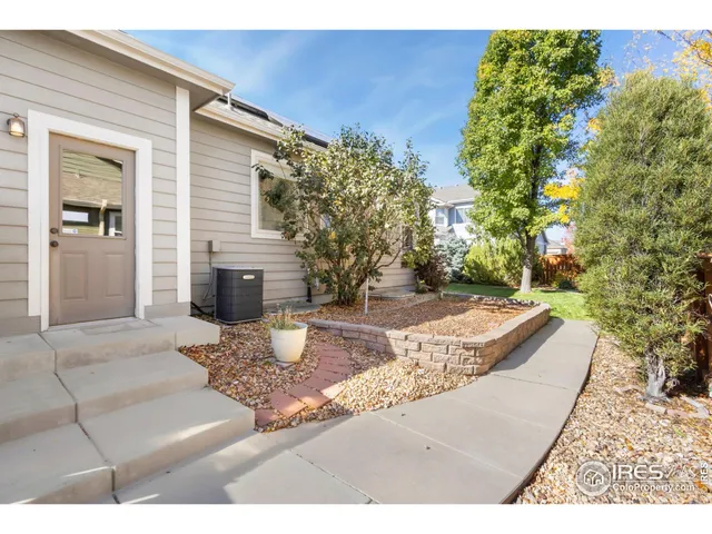 a view of a backyard of the house