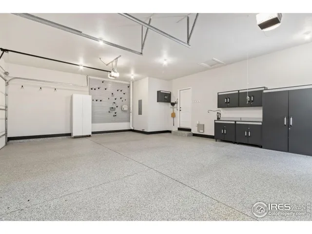 a view of a refrigerator in kitchen and natural light