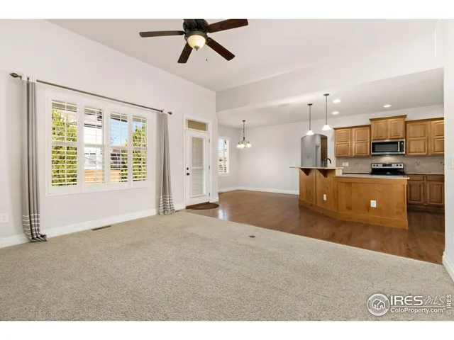 a view of kitchen with furniture and a window