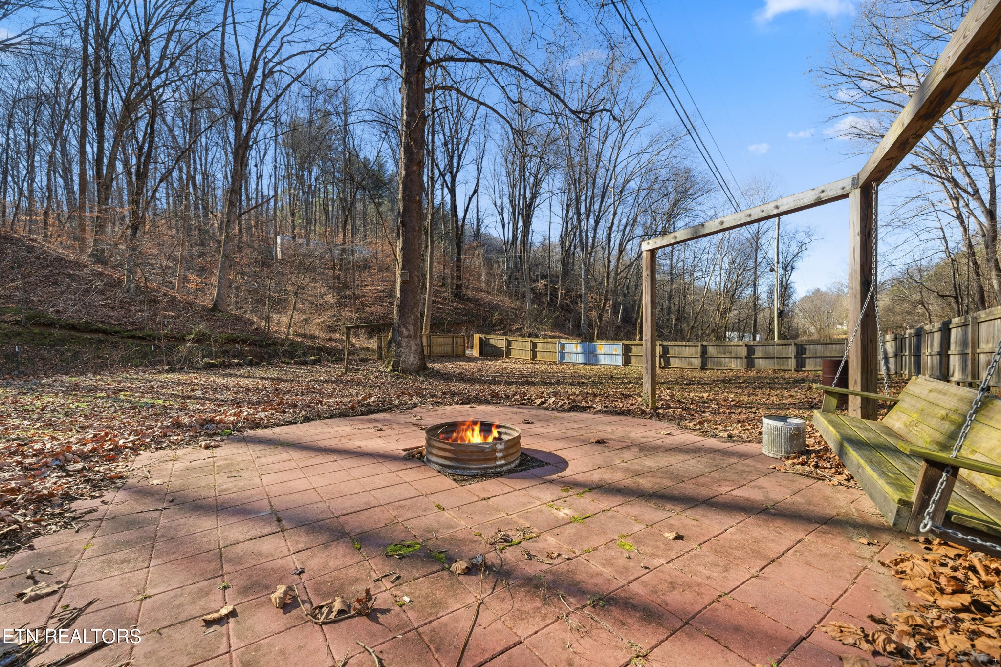 3214 Long Hollow Road Powell, TN 37849 - Photo 20 of 23 a backyard of a house with trees and outdoor space