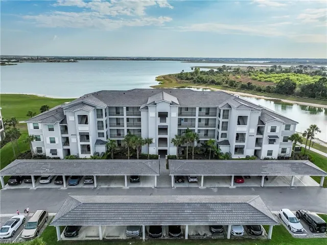 a view of building with balcony and seating space