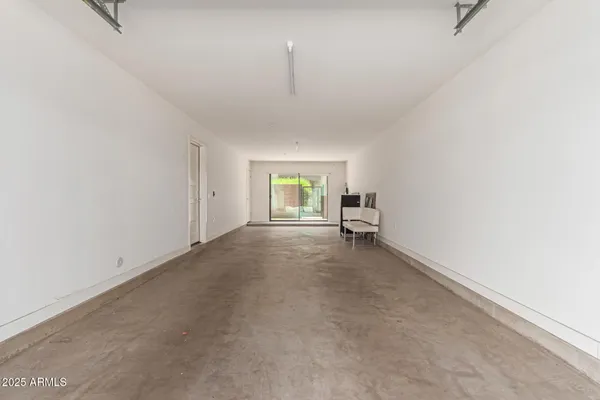 a view of empty room with fireplace