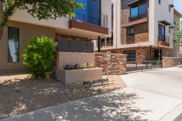 a view of a building with sitting area