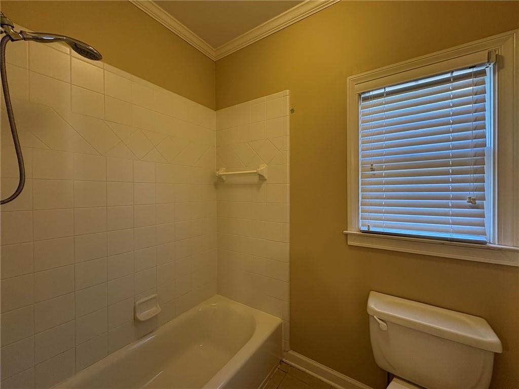 5930 Abbotts Run Trail Duluth, GA 30097 - Photo 19 of 32 a bathroom with a sink and a bathtub