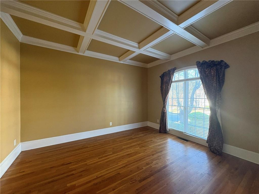 5930 Abbotts Run Trail Duluth, GA 30097 - Photo 2 of 32 an empty room with wooden floor and windows