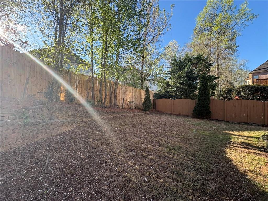 5930 Abbotts Run Trail Duluth, GA 30097 - Photo 31 of 32 a view of a outdoor space with a lake view