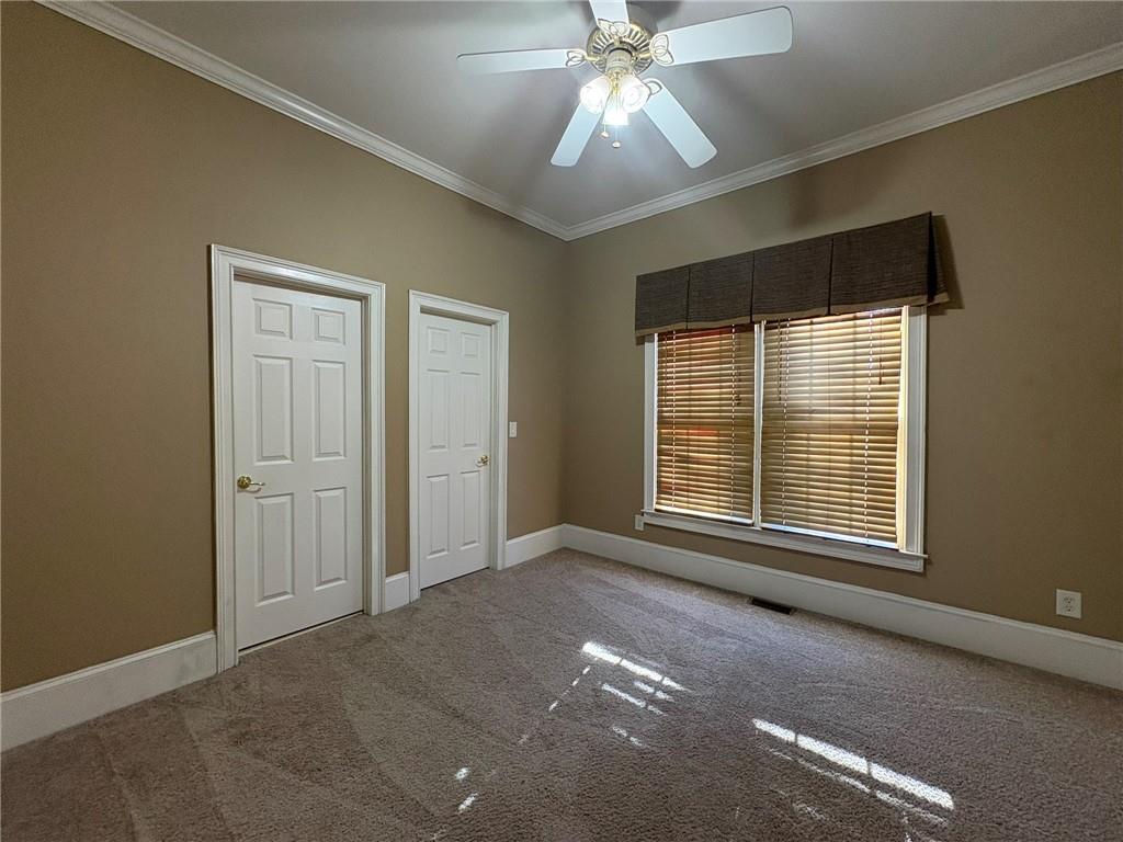 5930 Abbotts Run Trail Duluth, GA 30097 - Photo 9 of 32 a view of an empty room with a window