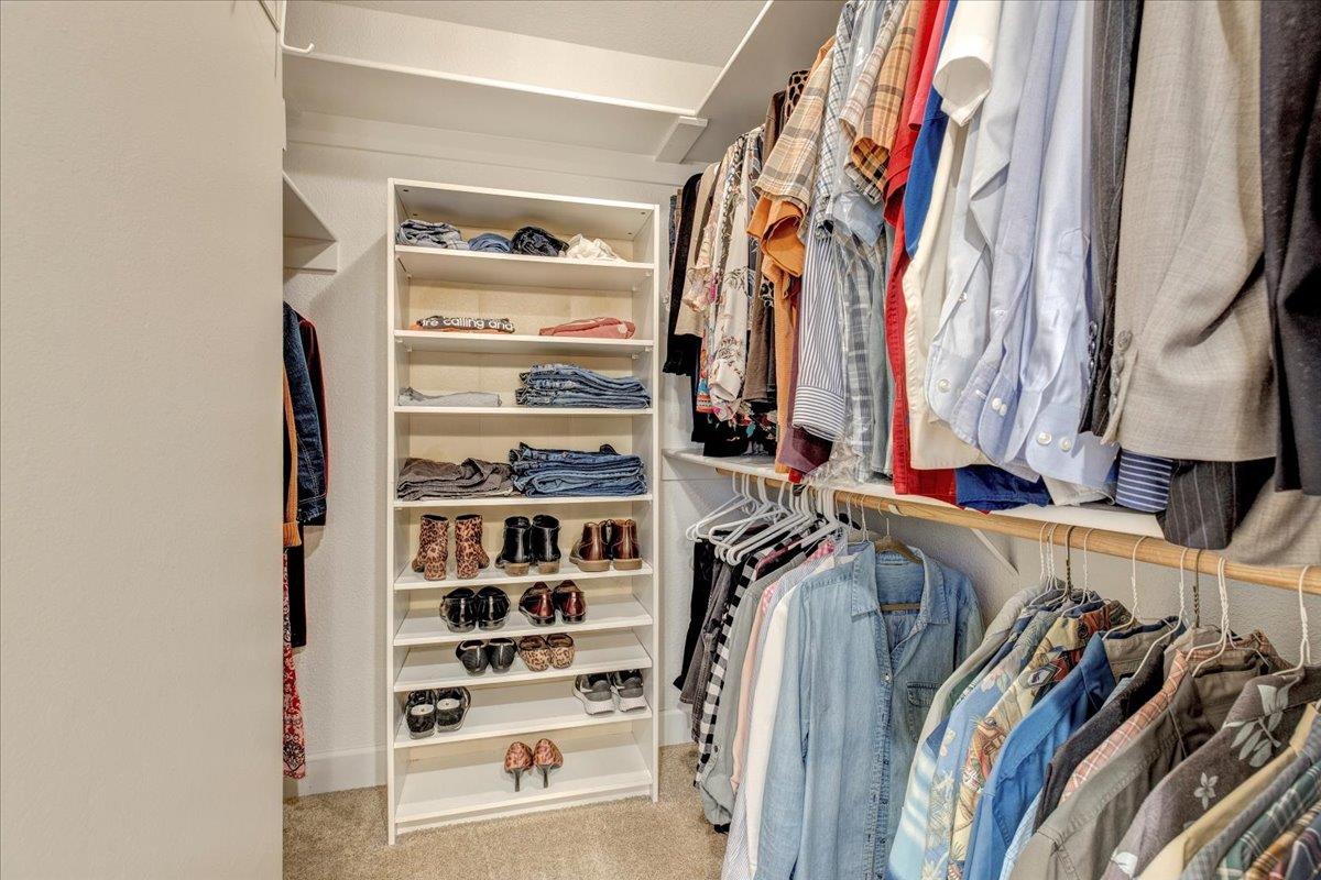 6763 Endmoor Drive San Jose, CA 95119 - Photo 16 of 32 a view of walk in closet with clothes and shoes